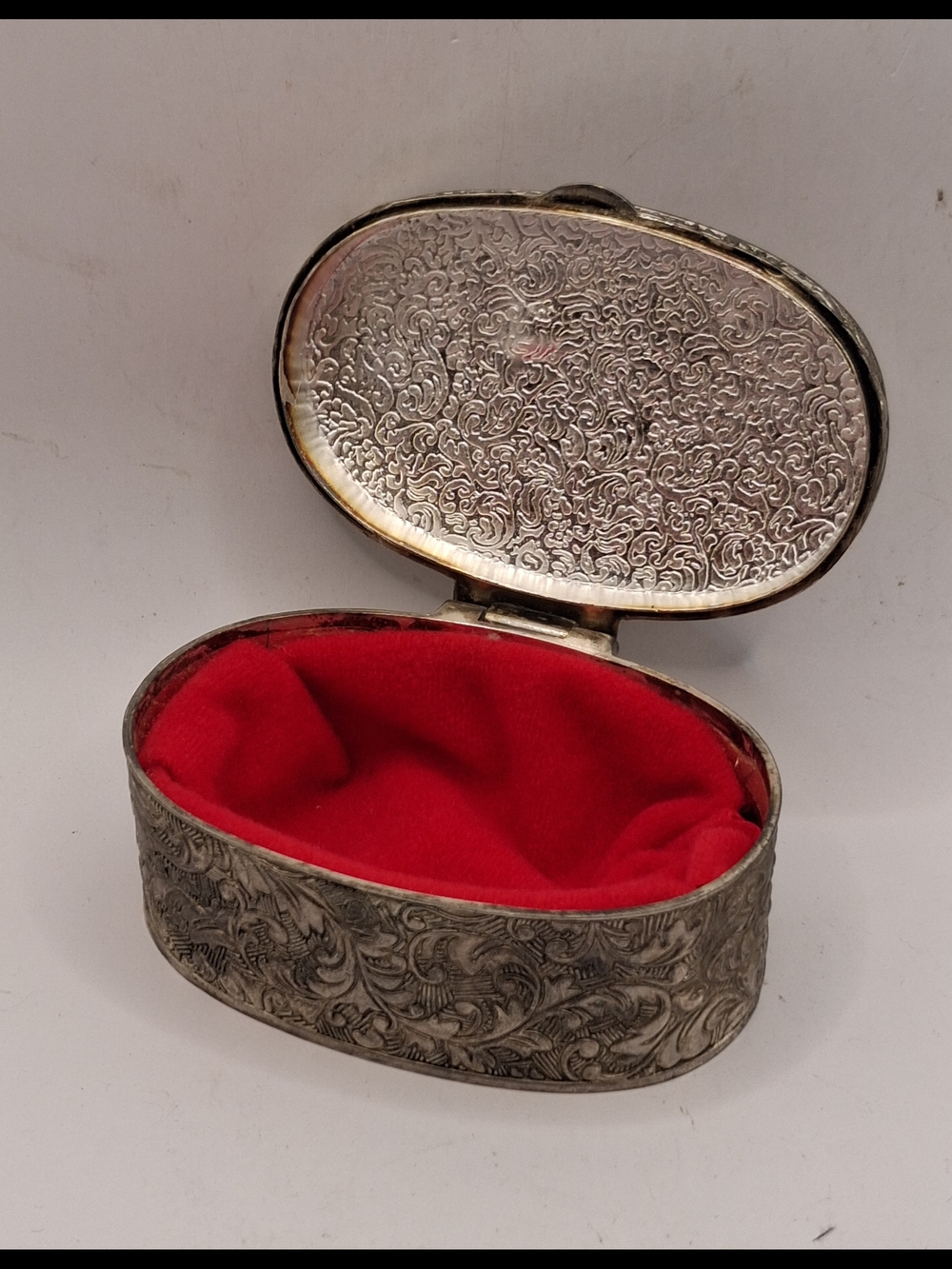 Ornate Silver-Tone Oval Jewelry Box with Red Velvet Lining